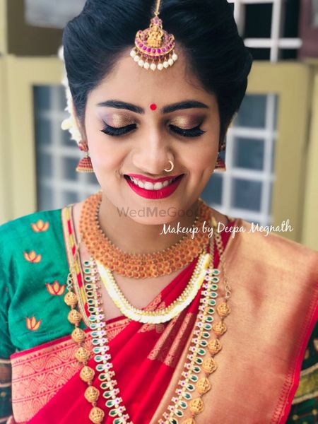 A south Indian bride in subtle makeup 
