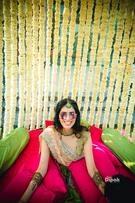 Bride mehendi with photobooth and sunglasses shot