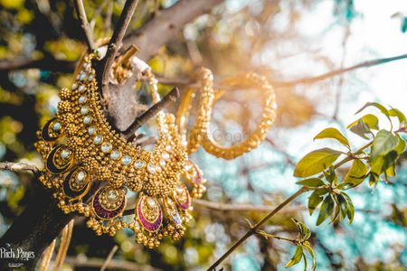 Bridal necklace and kada on branches 