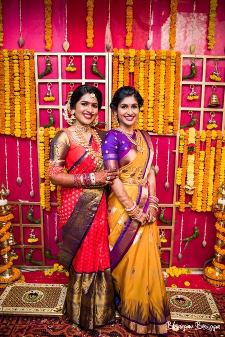 South Indian bride with sister in saree