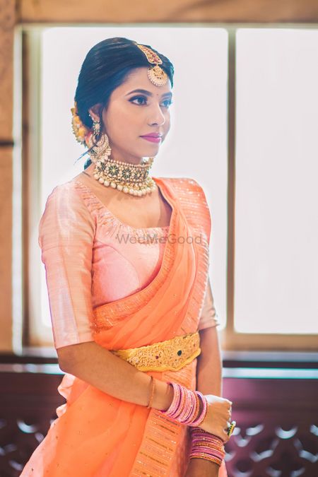 south indian contrasting blouse design with orange saree