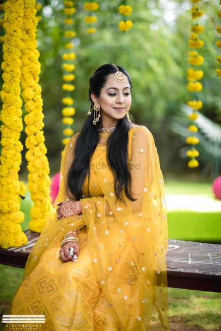Haldi bridal look in yellow outfit 