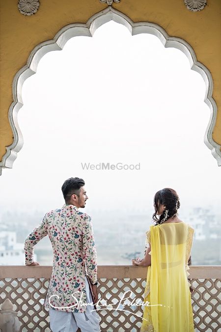 Photo of Fort pre wedding shoot with groom in floral sherwani