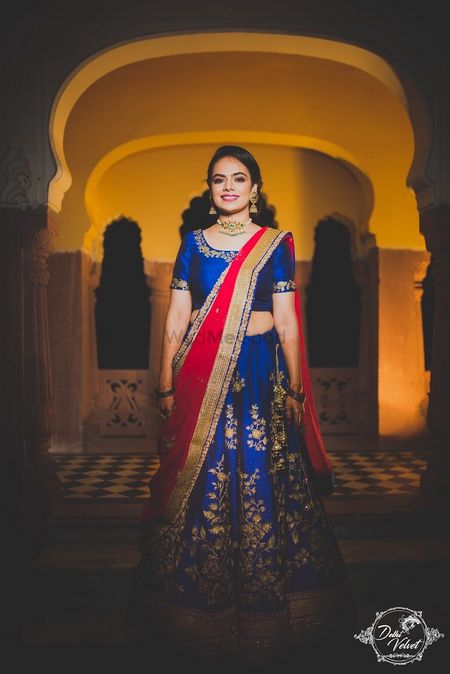 Royal blue and red lehenga for sangeet 