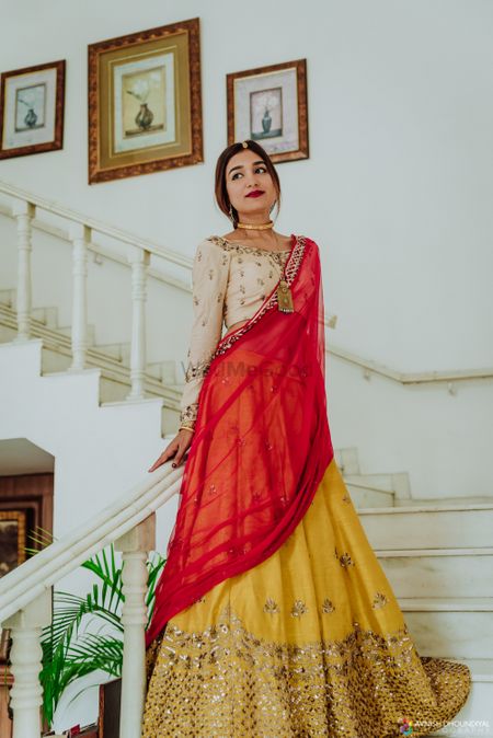 Photo of Simple bridal look in red and yellow lehenga