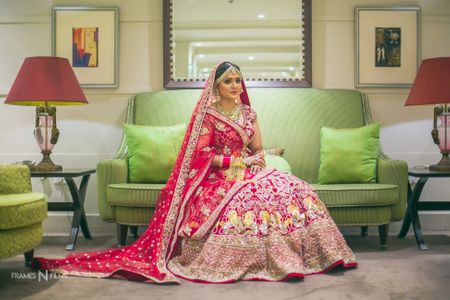 Hotel room bridal portrait in red 