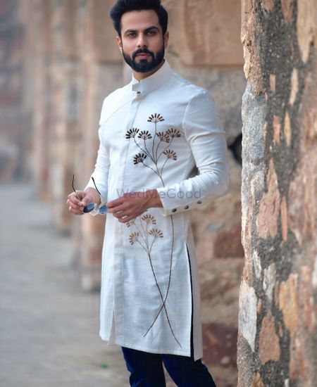 Modern groomwear with embroidered florals 