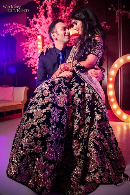 Sangeet couple portrait with embellished gown 