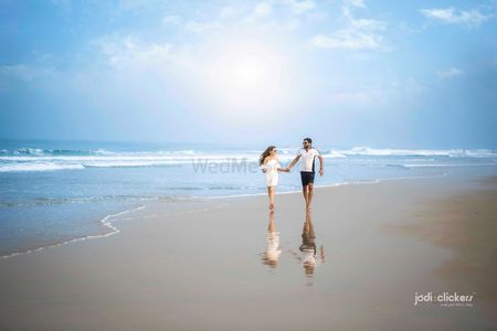Photo of Pre wedding shoot on beach with honeymoon shot