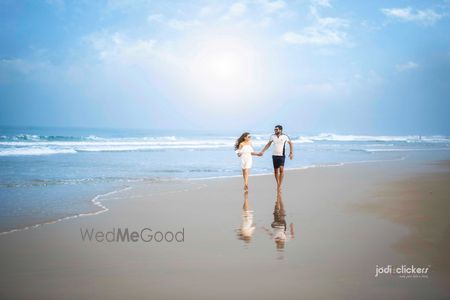 Photo of Pre wedding shoot on beach with honeymoon shot