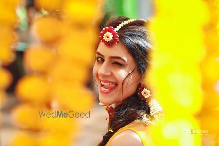 Bride making face on mehendi 