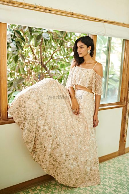 Off white light lehenga with cold shoulder blouse 