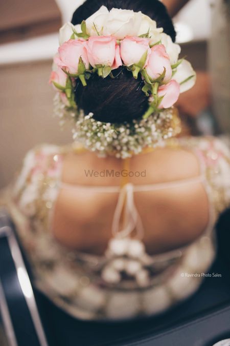Bridal bun with big roses 
