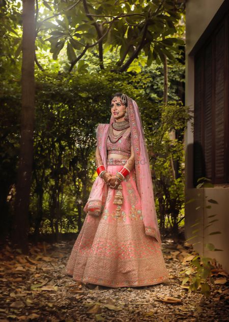 Photo of Ombre light pink lehenga with unique shades