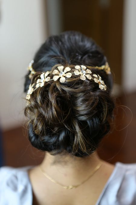Messy Wavy Bun with Hair Accessory