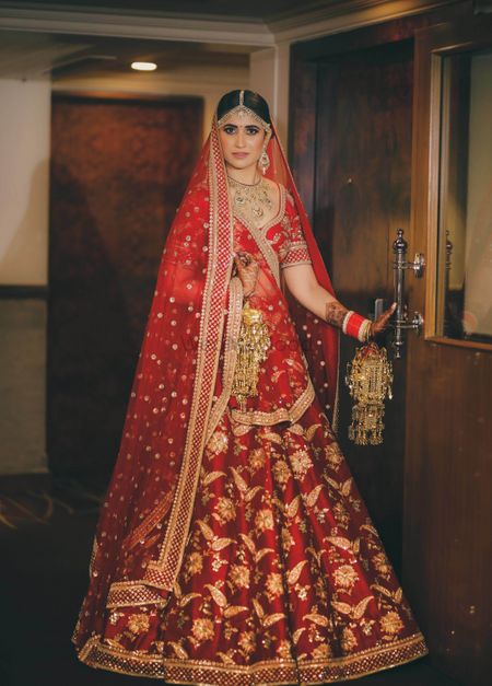 Red sabysachi bridal lehenga with embroidery 