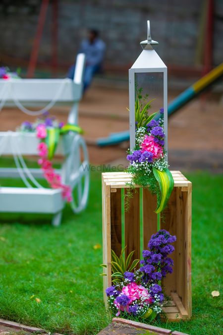 Photo of Decor with wooden crates and florals
