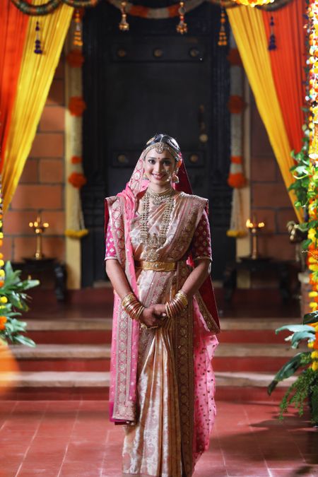 South Indian bride in pastel kanjivaram saree