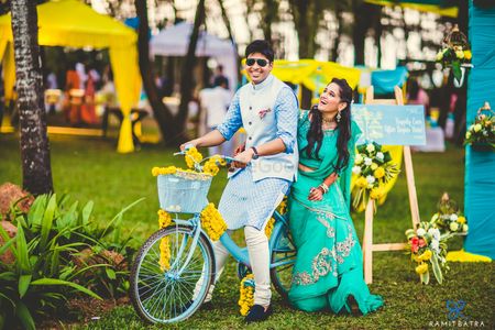 Photo of Couple on a Bicycle Mehendi Shot