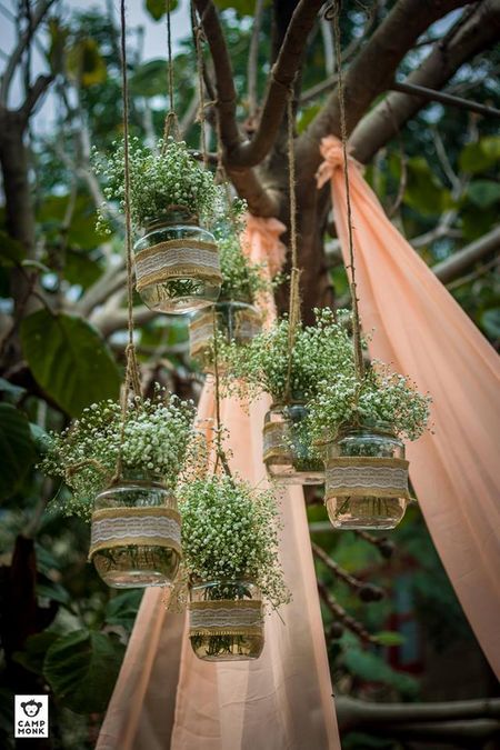 Photo of Rustic decor with hanging mason jars and babys breath