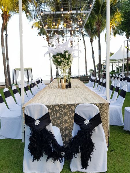 Cute feather chair tiebacks for wedding 