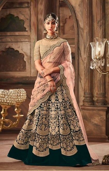 Pretty dark green and pink lehenga for an Indian wedding 