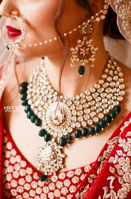 Bridal necklace with bib design and green beads