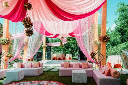 Mehendi decor idea with draped tents 