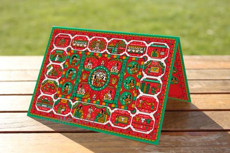 Photo of red and green wedding card