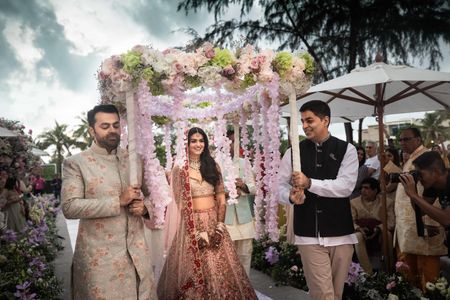 Bridal entry with phoolon ki chadar 