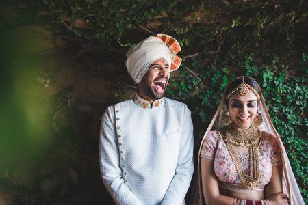 Bright and happy groom shot couple 
