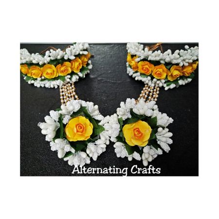 Photo of floral haathphool in white and yellow color