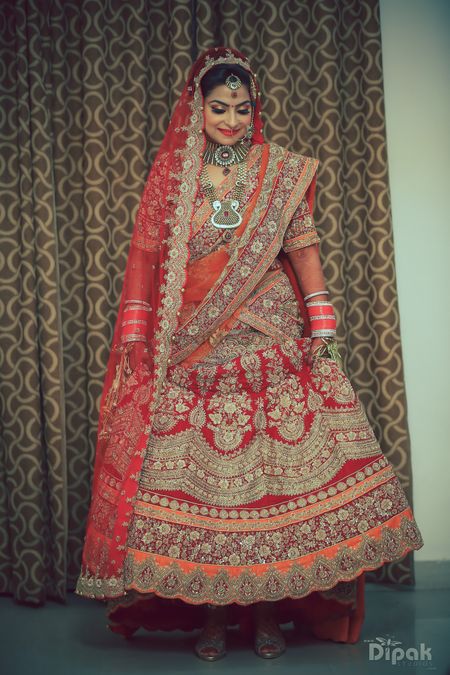 Red and Orange Lehenga with Gold Embroidery