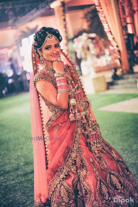 Bride in   Lehenga with Mathapatti Chuda and Kaleere