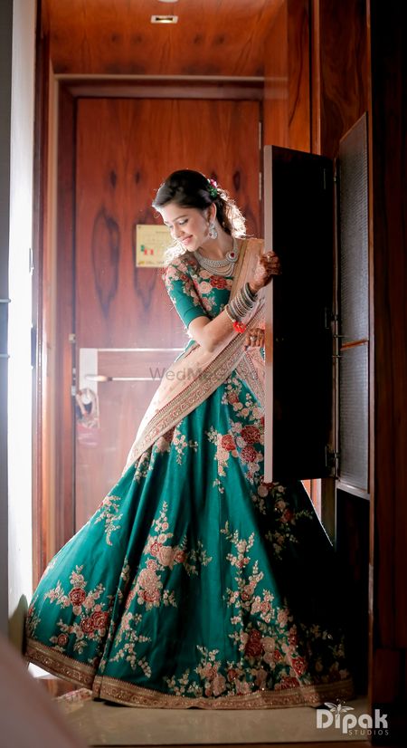 Bride in Teal Floral  Lehenga for Sangeet