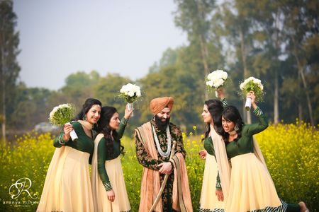 groom with bridesmaids shot