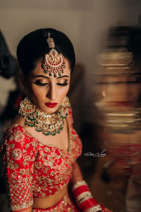 Pretty bridal jewellery with red and green 