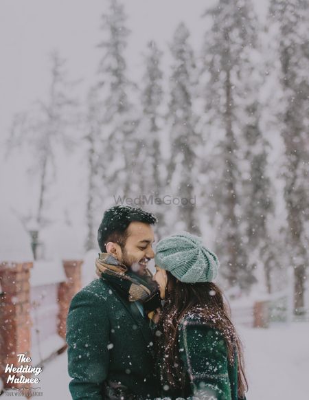 Outdoor pre wedding shoot in a place with snow 
