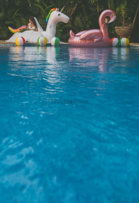 Photo of Pool party floats flamingo and unicorn