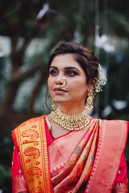 Marathi bride in floral saree and nath