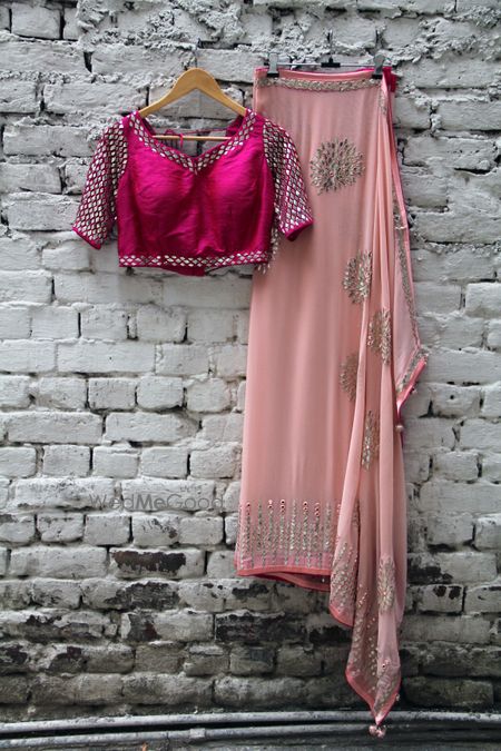 Photo of hot pink and peach saree