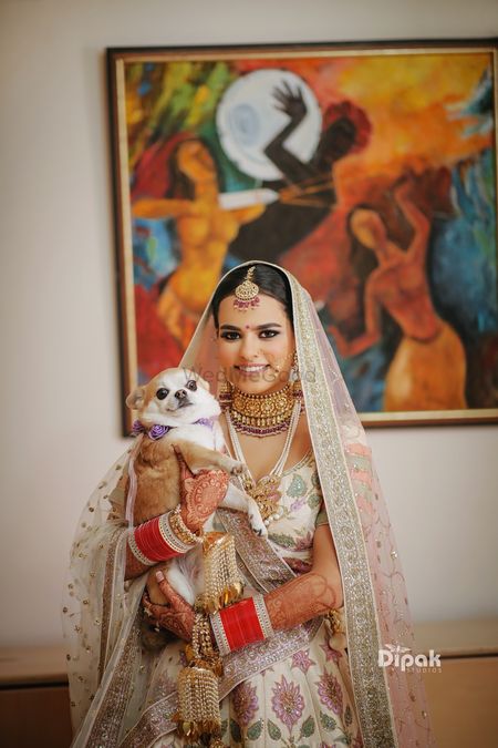 Bridal wedding day portrait idea with dog 