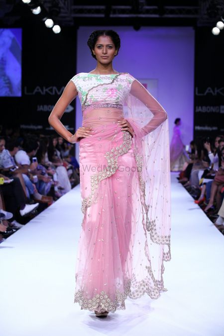 Photo of Anushree Reddy pink net sari with border and floral print blouse