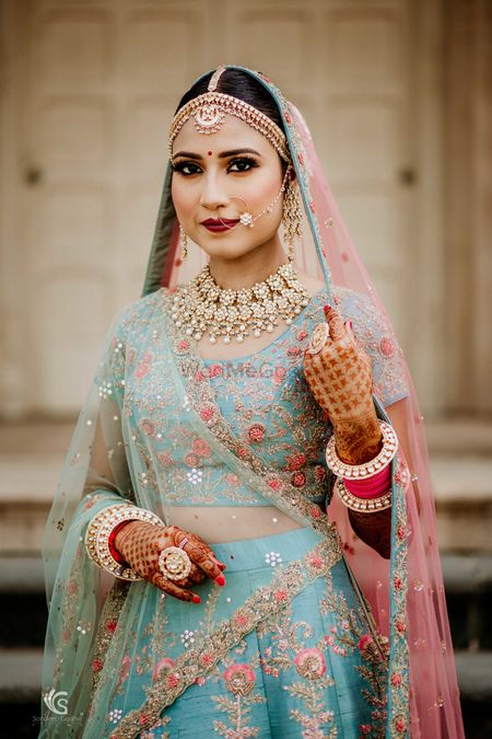 Blue and pink embroidered offbeat bridal lehenga 
