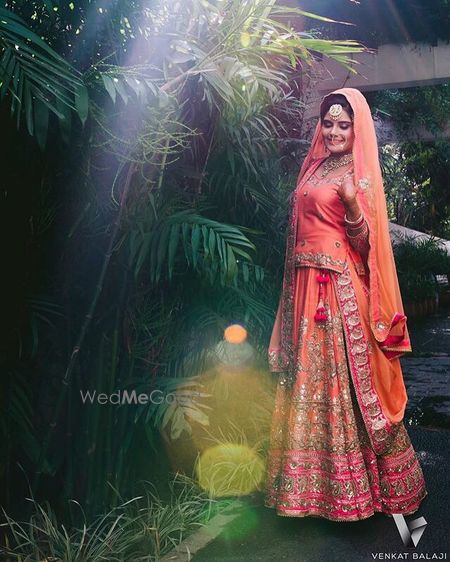 orange and pink bridal lehenga