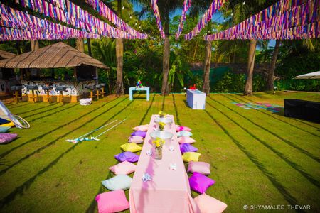 Mehendi or brunch decor idea with low seating cushions 