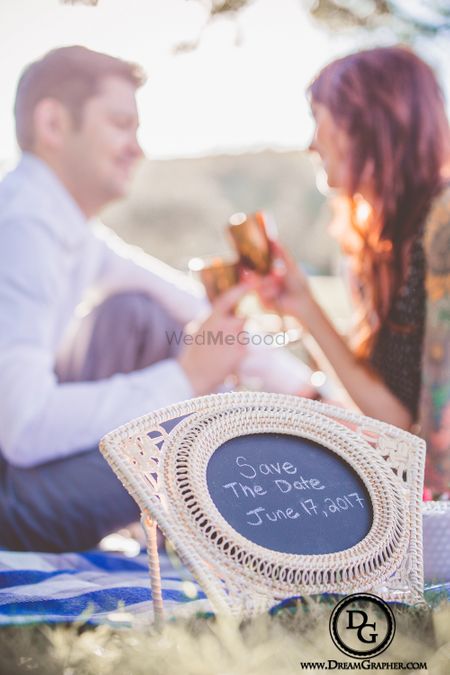Photo of Chalkboard Save the Date Idea with Couple's Photograph