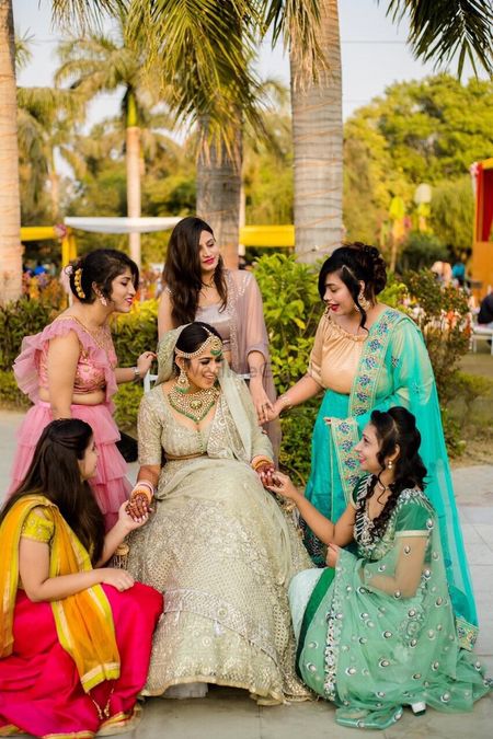 Brides with sisters around her for day wedding