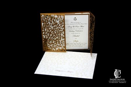 Photo of Gold and White Laser Cut Wedding Card