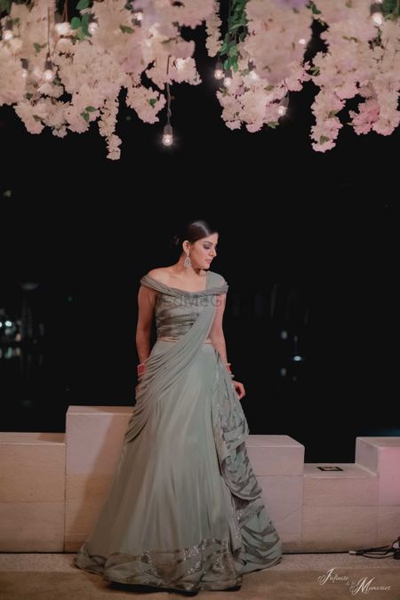 Bride in a green grey gown 